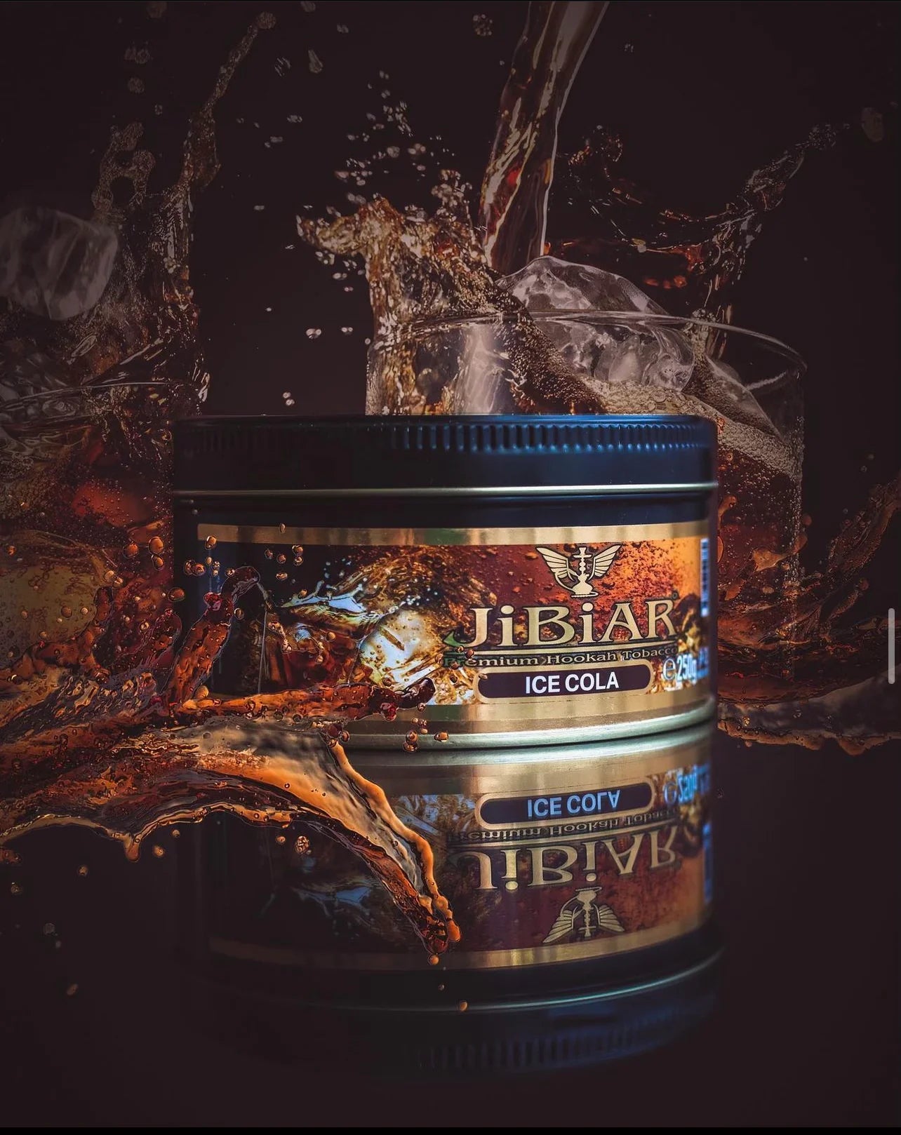 JiBiAR Ice Cola product with ice and water splashes on a dark background
