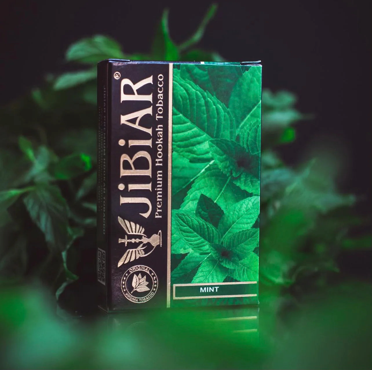JiBiAR mint premium hookah tobacco packaging with green leaves in the background