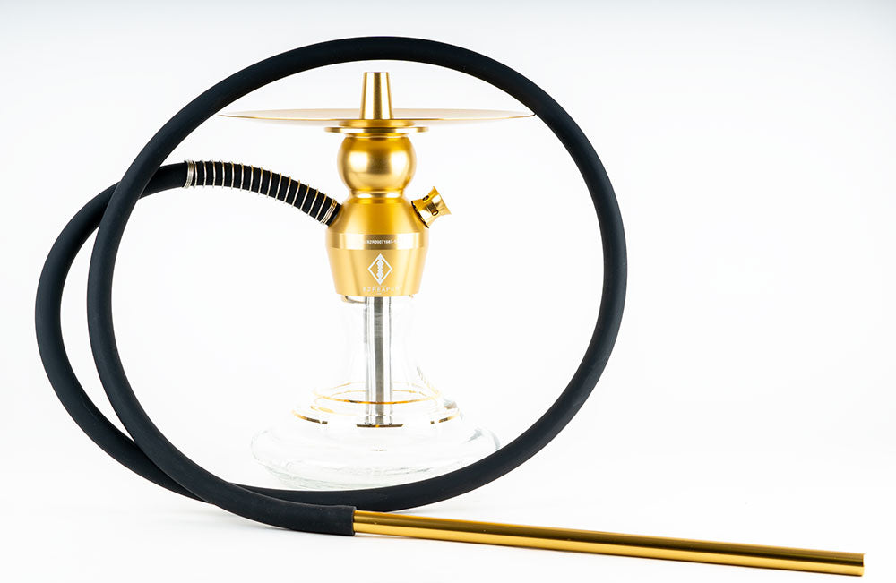 Compact and travel-friendly portable hookah for on-the-go smoking.